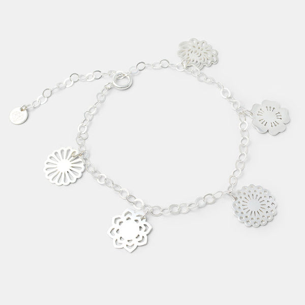 Silver charm bracelet with a bouquet of flowers